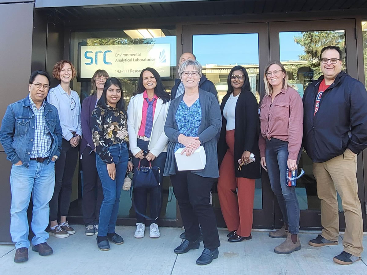 Lung Sask staff in front of the SRC lab entrance.